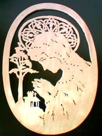 1/4" birch plywood. Backed with black felt.81/2" Wide,11 1/2" high. Natural finish